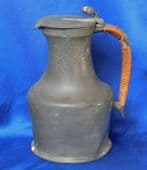 Antique hand hammered English pewter jug pitcher pot with lid Wicker handle