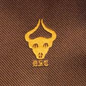 DSC kipper tie Vintage 1980s horned cattle ox skull emblem wide brown polyester