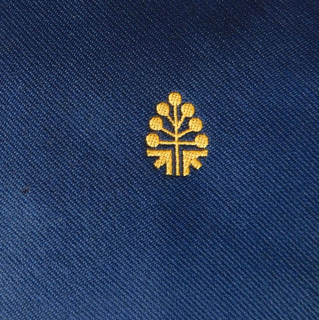 Macclesfield kipper tie Gold emblem Corporate company or bank logo ...
