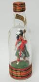 Scottish soldier in mini glass bottle Souvenir of Scotland 12 cm kilt Vintage