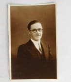 Vintage postcard photograph Young man in round glasses black and white picture